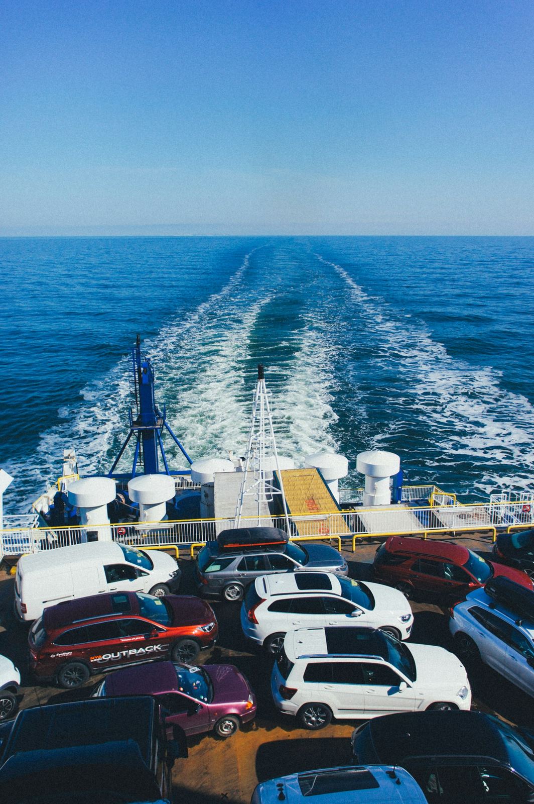 Cars loaded on a RORO cargo vessel for international shipping